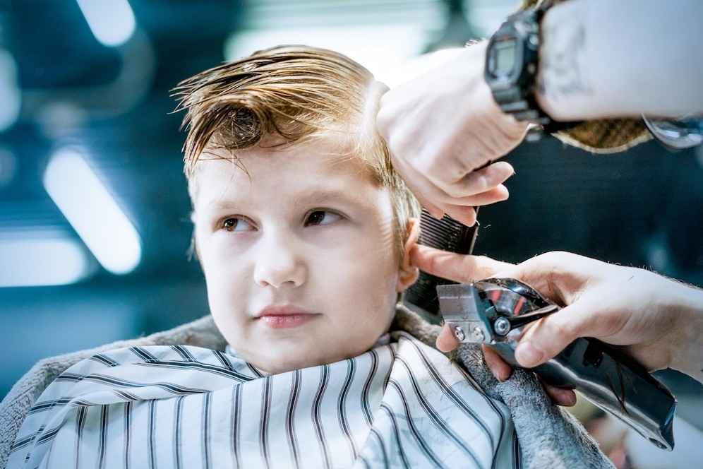 male-barber-s-hand-trimming-boys-hair_657590-126-transformed_11zon